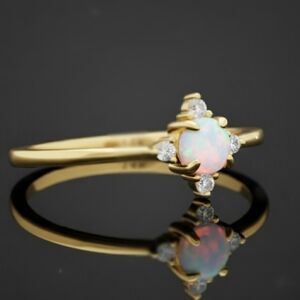 Elegant Gold Opal Ring with Diamond Accents